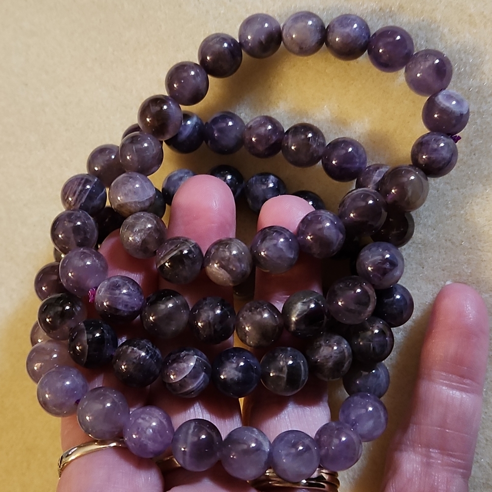 Georgeous Amethyst stretch  10mm bracelets. Buy one bracelet get 2nd 20% off